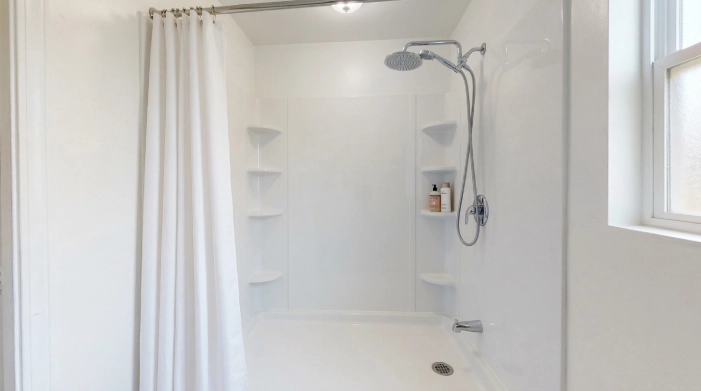 white acrylic shower liner installation